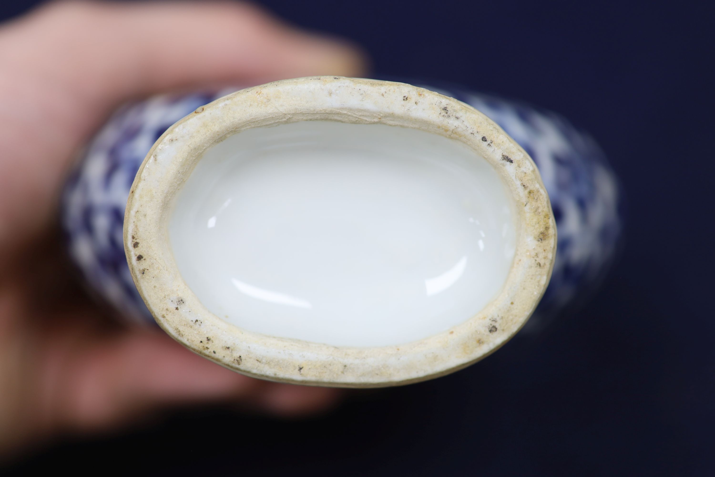 Two 19th century Chinese blue and white moon flasks and a teapot, tallest 21cm